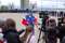 Акция "100 оружейников" у монумента "Навеки с Россией". Российский спортсмен, президент Федерации суперэкстрима России, создатель экстремального силового шоу "Русские Богатыри" Александр Евгеньевич Муромский беседует с представителями СМИ